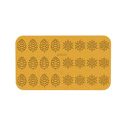 Tapis décor silicone motifs pommes de pin et flocons de neige