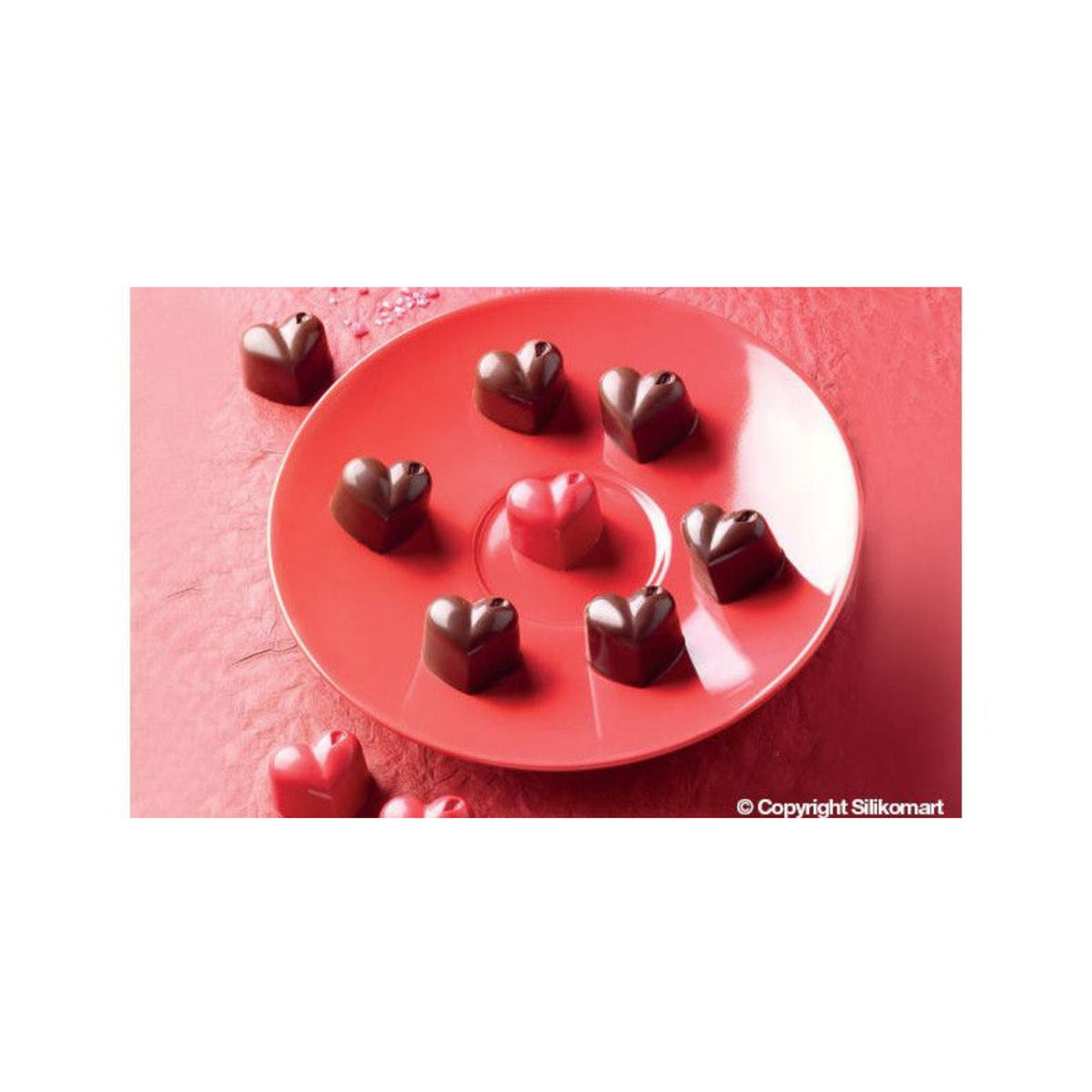 Chocolats en forme de cœur réalisés avec le moule Silikomart