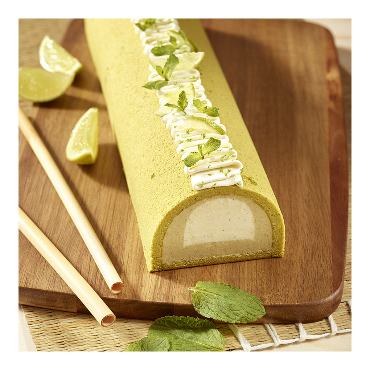 Bûche citron vert et menthe réalisée dans une gouttière ronde