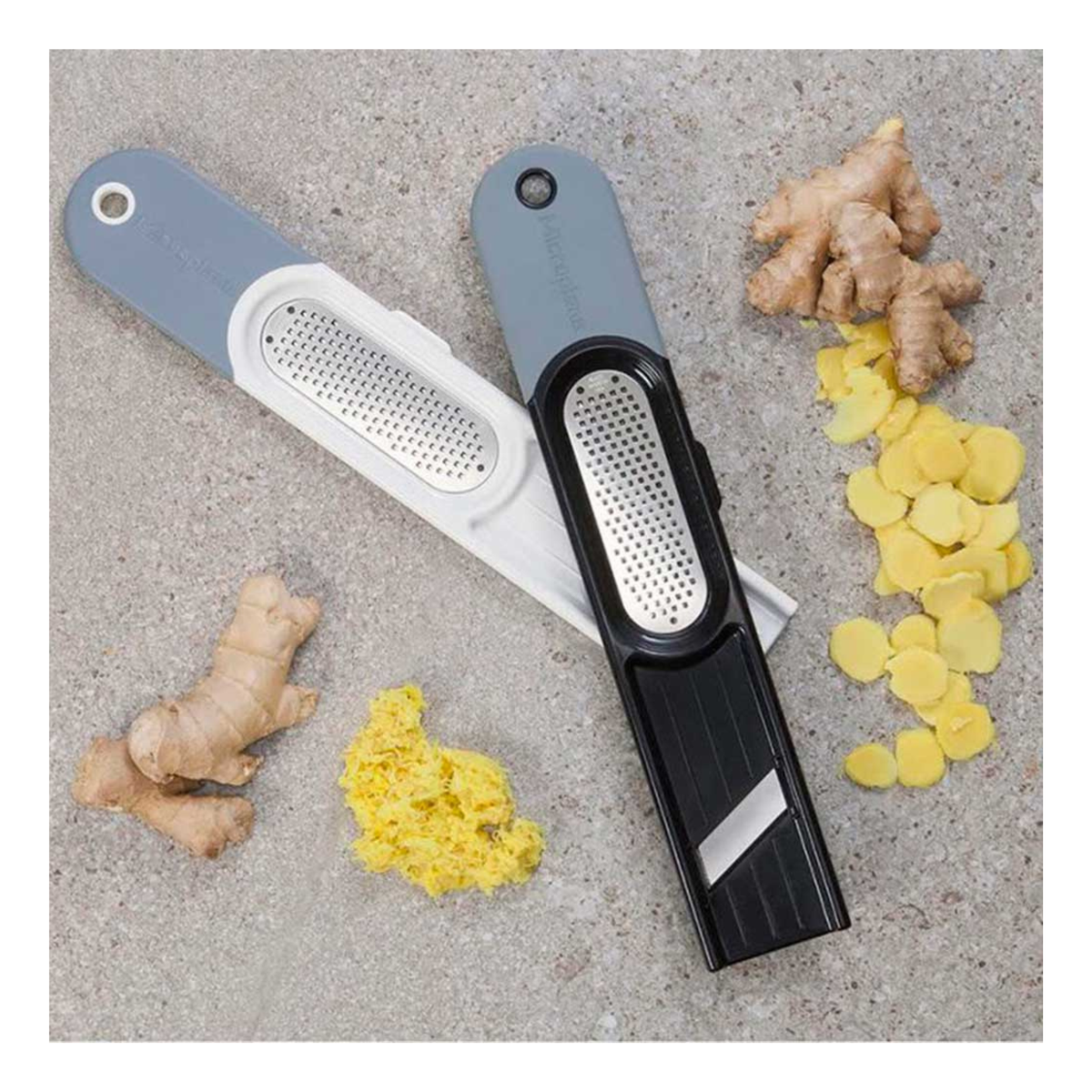 Râpe et mandoline à gingembre avec gingembre frais