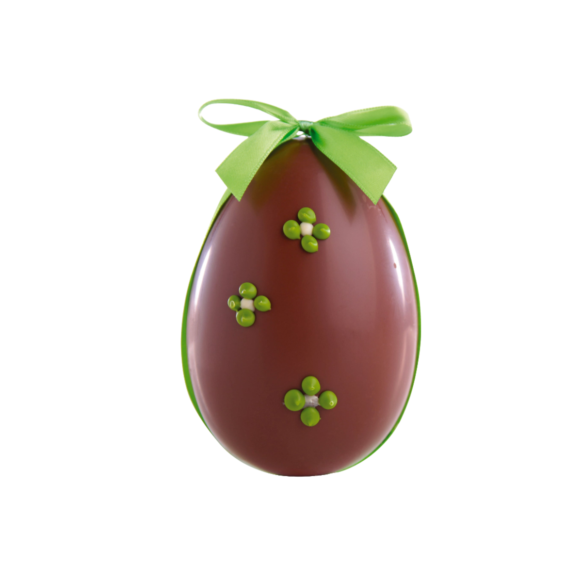 Œuf de Pâques en chocolat décoré de fleurs vertes avec ruban vert
