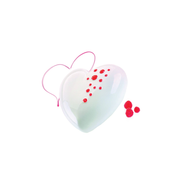 Entremets en forme de cœur blanc au glaçage miroir, décoré de framboises