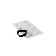 Moule en silicone Silikomart avec empreintes en forme de cœur et cercle à tarte perforé cœur