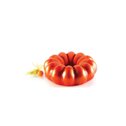 Entremets en forme de couronne cannelée avec glaçage orange brillant