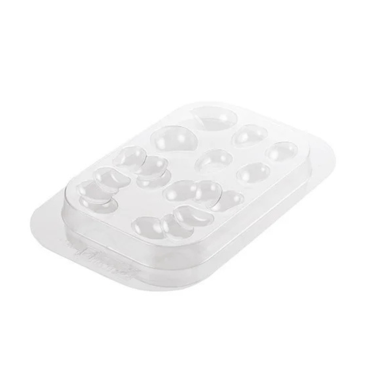 Moule en plastique transparent avec plusieurs empreintes pour réaliser les cornes, oreilles, sabots et nez d’un renne de Noël.