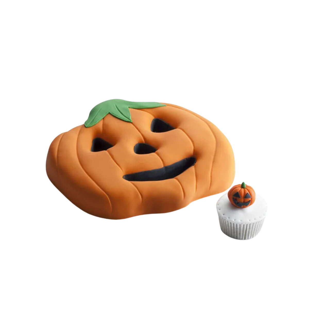 Gâteau en forme de citrouille Halloween orange avec visage et décoration verte