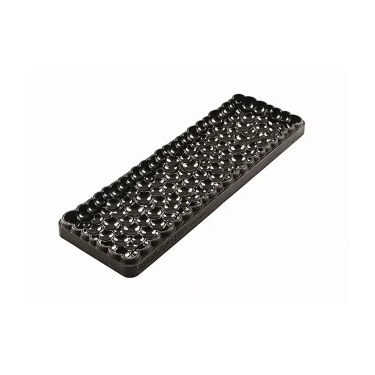 Tapis décor en silicone noir Silikomart de forme rectangulaire avec des bulles en relief de différentes tailles.
