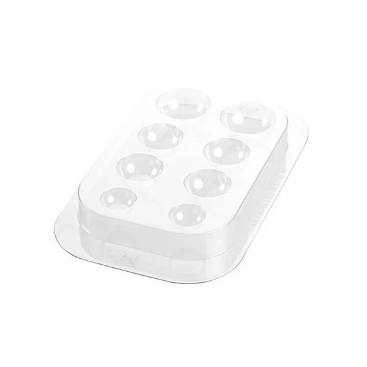 Moule en plastique transparent avec huit empreintes rondes de différentes tailles pour créer les yeux et les bras d’un bonhomme de neige.