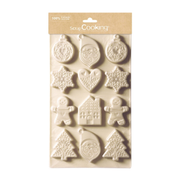 Moule silicone blanc ScrapCooking à 12 empreintes de Noël avec motifs de sapins, flocons, bonhommes en pain d'épices, cœurs, boules et maisons.