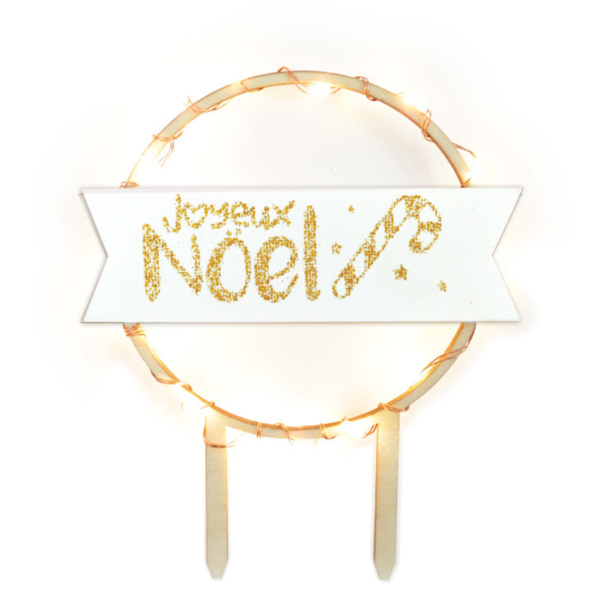 Cake topper de Noël rond lumineux avec inscription Joyeux Noël dorée sur bandeau blanc, guirlande LED et deux pics de fixation.